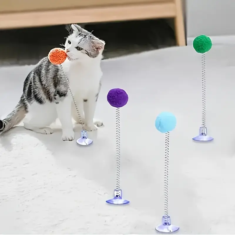 This 2-piece interactive cat toy set includes a plush ball and a metal spring stick.